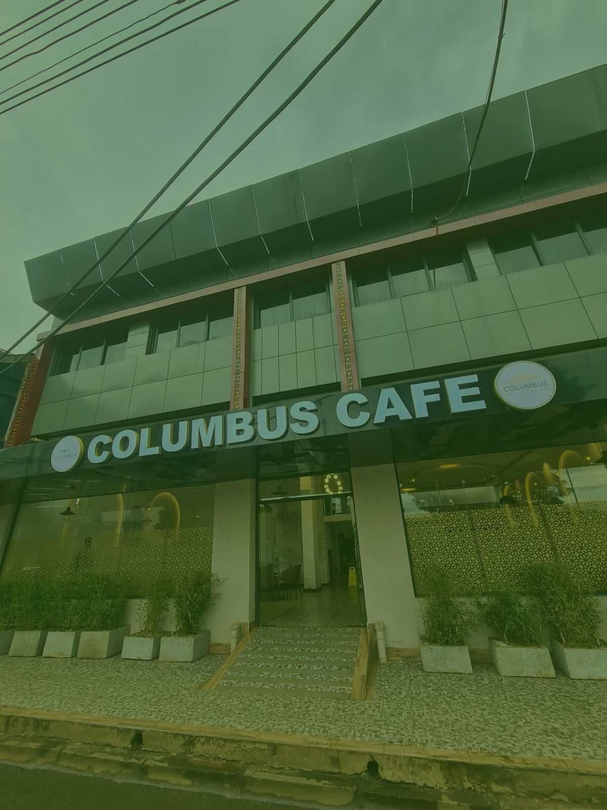 Columbus Cafe Restaurant exterior at dusk